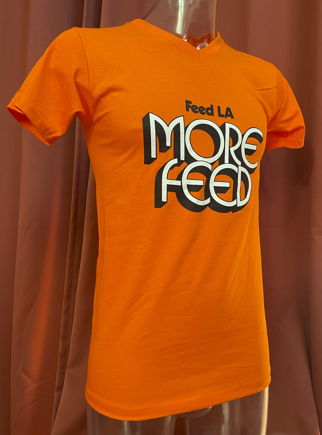 "Feed LA More Feed" T-Shirt, b/w print on orange